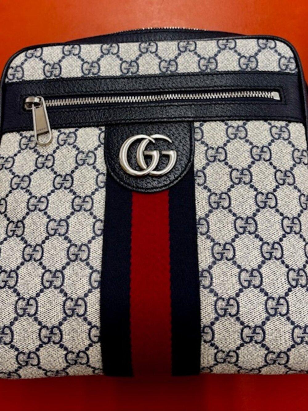 Authentic GG Supreme Monogram Textured Crossbody Bag Beige and Navy Blue